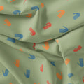Green Muslin Digital Printed Fabric With Quirky Kids Hand Prints – hand4