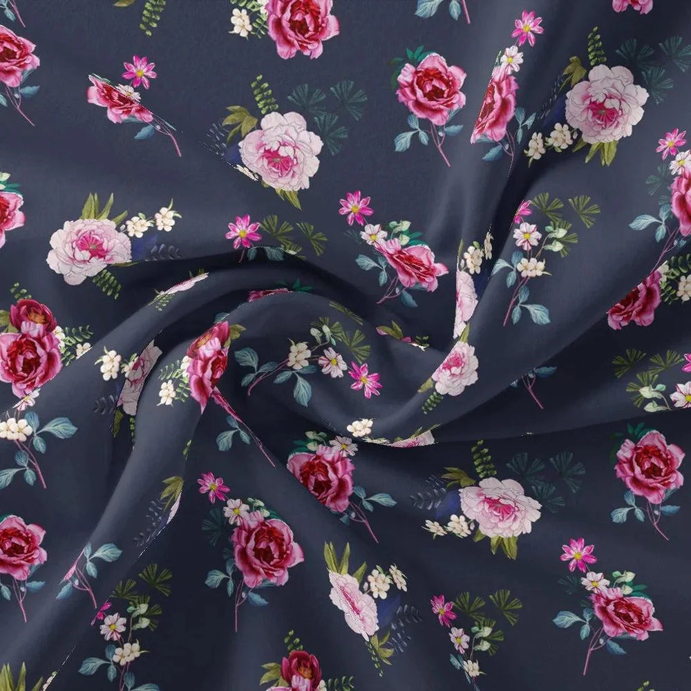 A cascade of painterly florals unfolds across a canvas of deep, lustrous satin.